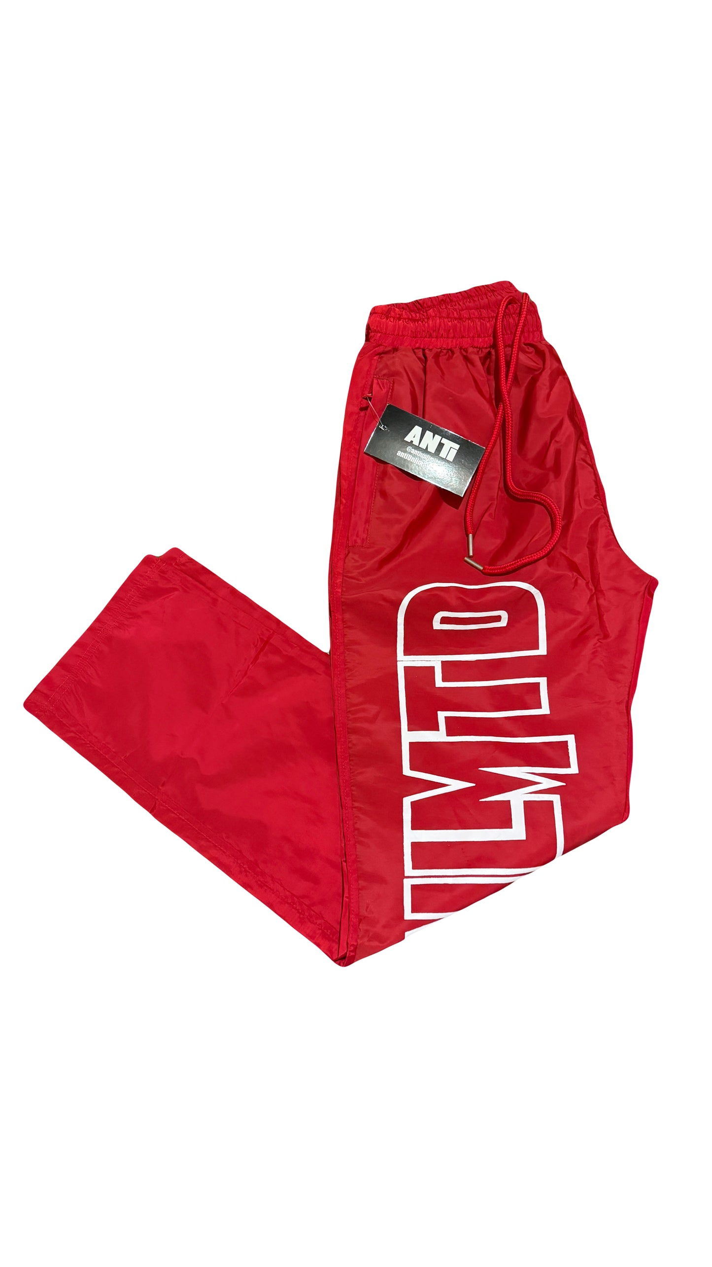 RED NYLON TRACK PANTS