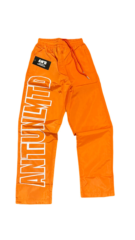 ORANGE NYLON TRACK PANTS